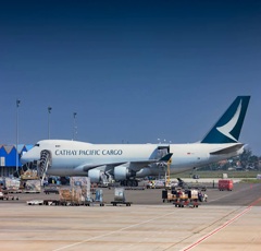 A White and Blue Airplane on Airport